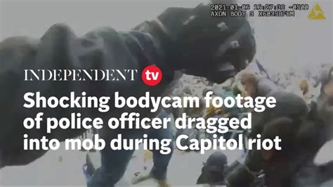 Shocking Bodycam Footage Shows Police Officer Being Dragged Into Mob During Capitol Riot