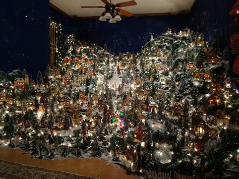 Or, break the christmas village up into a couple rows on your shelf. A little Christmas village my mom puts up for the Holidays ...