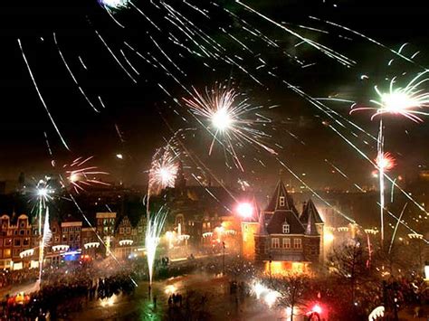 Something like he or she is catching or capturing the years? New Year's Traditions - fastfoodinusa.com