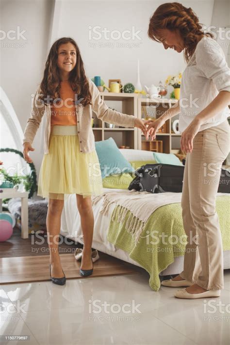 Girl Trying On Mothers High Heels Stock Photo Download Image Now Istock