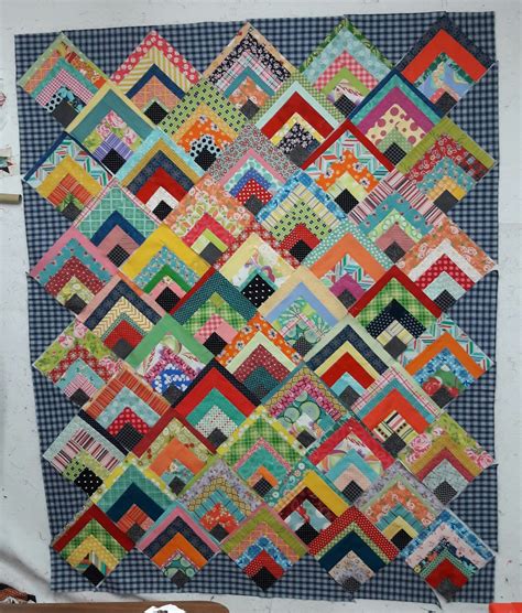 Many people speculate that this pattern is as ancient as the egyptian pyramids. Em's Scrapbag: Scrappy Quarter Log Cabin Quilt Tutorial