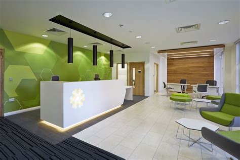 Reception Area With Green Wall Clinic Interior Design Hospital