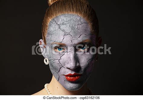 Cracked Surface On Woman Face Dry Skin Concept Isolated On Black
