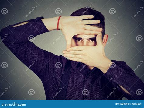 Young Man Peeking Through His Fingers Hands Stock Image Image Of