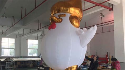 Chinese Factory Makes Giant Inflatable Trump Like Roosters