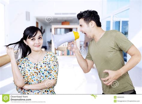 For example, my boyfriend has a crazy work schedule. Angry Boyfriend At Ignorant Girlfriend Stock Image - Image of furious, bullhorn: 30562025