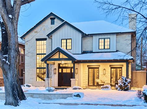 The stone wall continues into the house, creating a foyer. Stone Modern Farmhouse - East Wash Park - Gunlock Homes