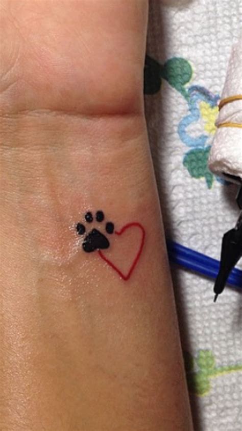 Paw print tattoos are becoming increasingly popular and each one has a different meaning, depending on the tatoos girly tattoos short quote tattoos. Pin by Megan Shipp on Tattoo inspiration | Tattoos, Dog ...
