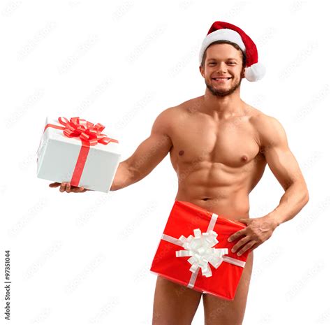 sexiest santa naked santa claus covering himself with a present posing against white background