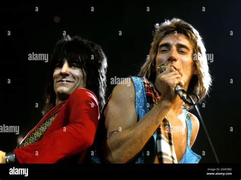 rock stars rod stewart r and ronnie wood l of the faces performing on stage circa 1974