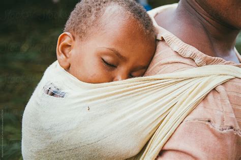African Baby Sleeping In Her Mother´s Back Mizan Ethiopia By