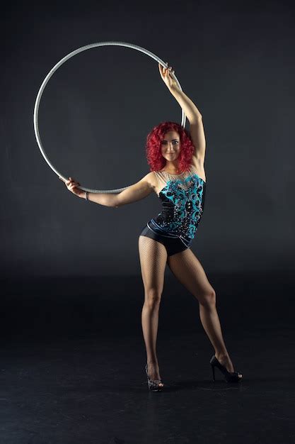 Premium Photo Hula Hoop Girl Performs Circus Performer In An Artistic