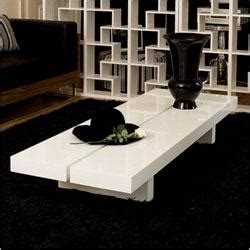 This is a west elm lacquer storage coffee table in white. Lacquer Storage Coffee Table - west elm