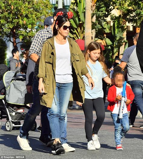 Sandra bullock is good at keeping secrets. Sandra Bullock takes Louis and Laila to DisneyLand | Daily ...