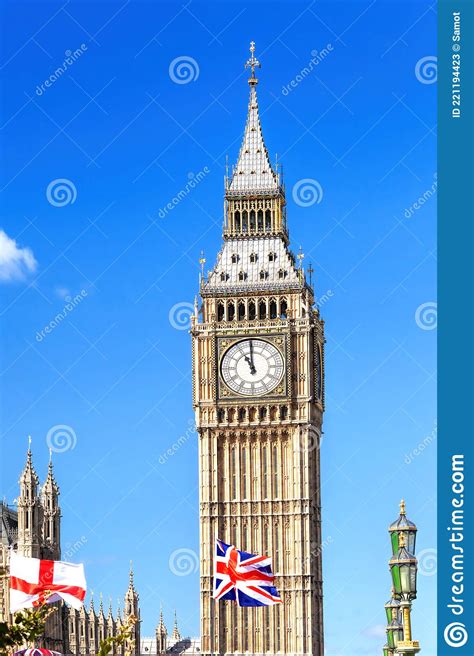 Big Ben With Flag Of England And United Kingdom In London Against Blue Sky Stock Image Image