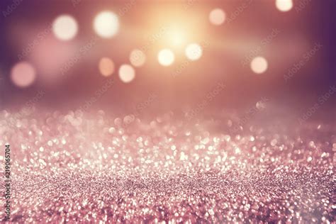 Rose Gold Glitter Lights Bokeh Abstract Background Holiday Stock Photo
