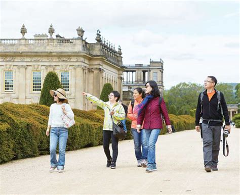 Chinese Visitors Tour The Grounds Of Chatsworth House In