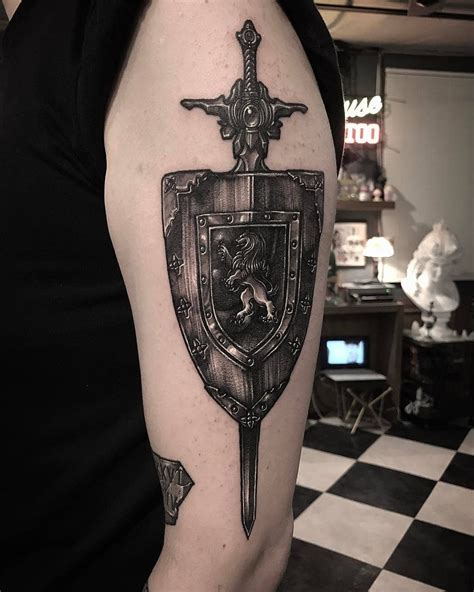 23 shoulder shield tattoo evynleni