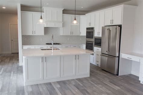 20+ white kitchen cabinets with white quartz countertops