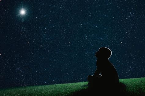 Kid Looking Up At The Stars