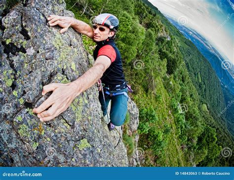 Young White Man Climbing A Steep Wall Stock Photos Image 14843063
