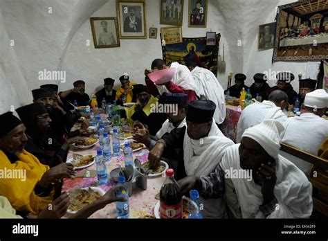 Ethiopian Orthodox Monks Eating At The Deir El Sultan Monastery Which