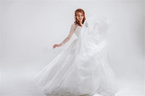 Delightful Red Haired Bride In A Luxurious Dress Light Background Stock Image Image Of