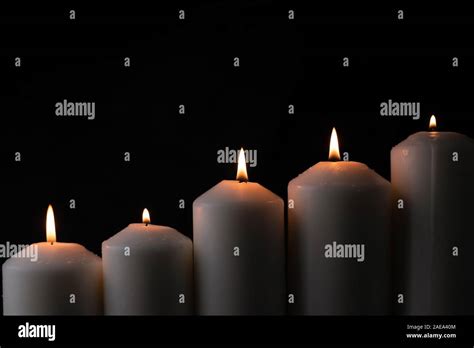 Five Light Flame Candle Burning Brightly On Black Background Stock