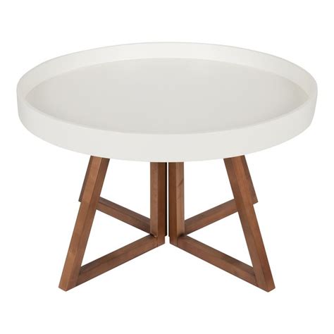 A White Table With Wooden Legs On A White Background