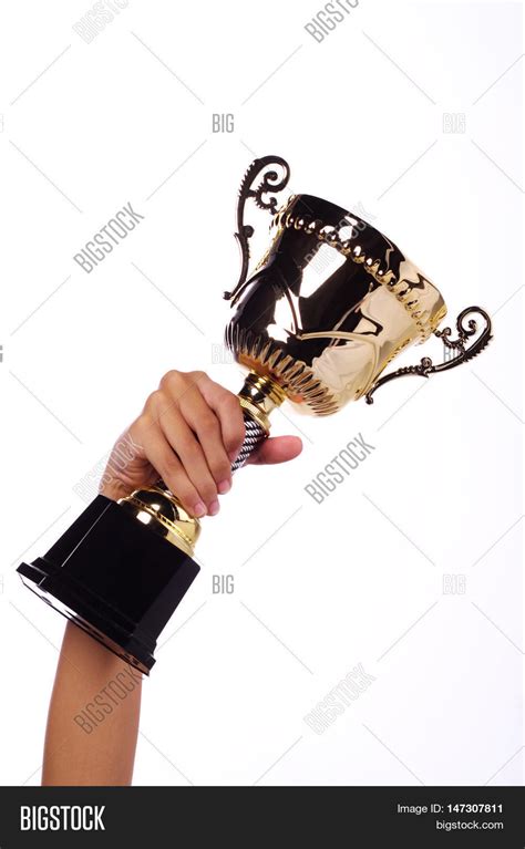 Hand Holding Throphy Image And Photo Free Trial Bigstock