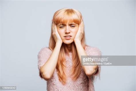 Covering Ears With Hands Photos And Premium High Res Pictures Getty Images