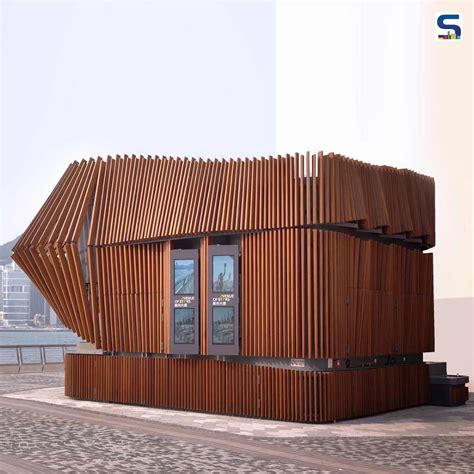 The Timber Facade Of This Robotic Harbour Kiosk In Hong Kong Opens And