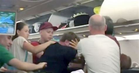 brawl breaks out on plane after man ‘slaps woman in the aisle daily star
