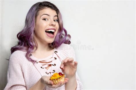 Excited Young Model With Purple Hair Enjoying Tasty Dessert With Berries Space For Text Stock