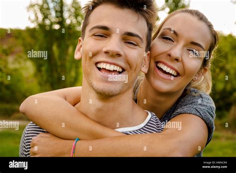 Portrait Of A Happy Young Couple Embraced Together Stock Photo Alamy