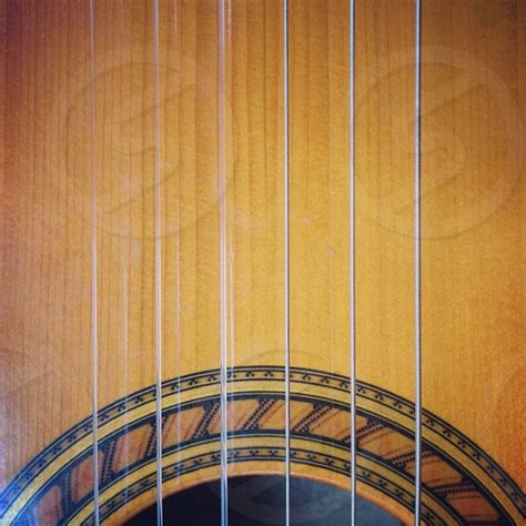 Brown Acoustic Guitar By Juan Brockhaus Photo Stock Snapwire