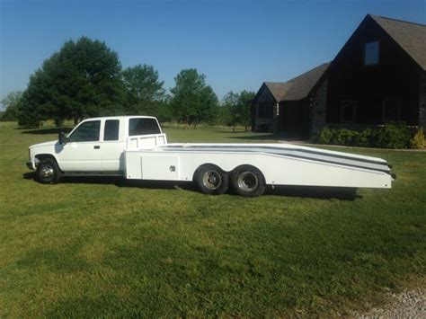 Actual production models may vary. 1993 GMC Car Hauler - Custom 19ft hodges bed, new paint ...