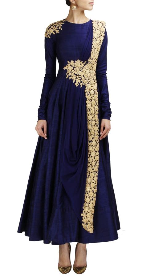 Because of its ease of wear and comfort, designer wedding gowns are the best outfit for the party and even for the special occasions like wedding. RIDHI MEHRA Navy blue anarkali with gold embroidery www ...