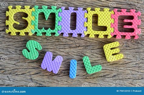 Smile Smile Word From Wooden Letter Blocks Royalty Free Stock Photo