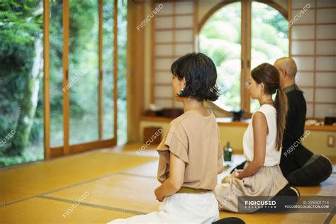 Two Japanese Women And Buddhist Priest Kneeling In Buddhist Temple Praying — Buddhism Small