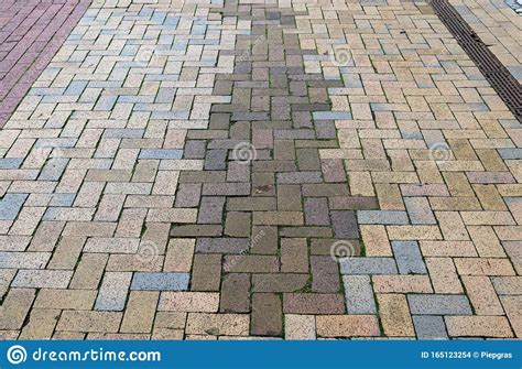 Detailed Close Up View On Cobblestone Streets And Sidewalks In High