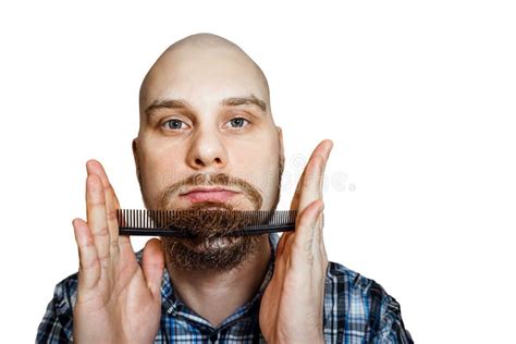 Guy Combs His Hair With A Comb Portrait Of A Young Guy Who Hold