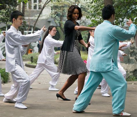 on visit to china michelle obama eases in some political messages the new york times