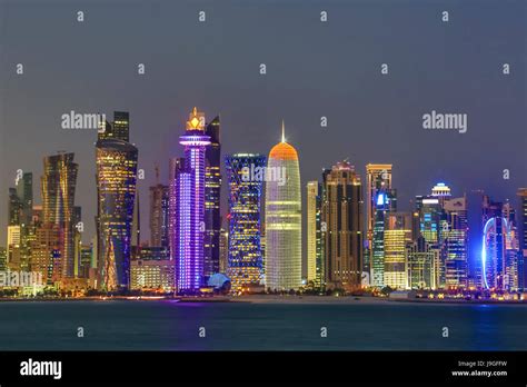 Qatar Doha City The Corniche West Bay Skyline At Sunset Stock Photo