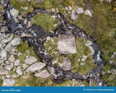 Aerial Drone View Landscape Of River Flowing Down Waterfall And Over