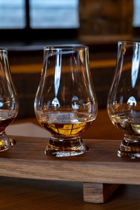Tasting Of Dram Single Malt Scotch Whisky On Seashore In Scotland Old