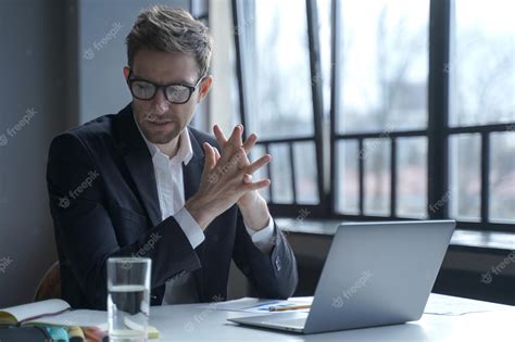 Premium Photo Brooding Concentrated German Businessman In Formal Suit