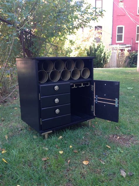 I have an awesome repurposed wine bar. It used to be a ... They are also directly responsible for keeping your bottles organized and safe.