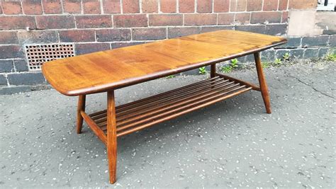 Designed by lucian ercolani, for his furniture company which was launched in england in 1920: Mid-Century Elm Coffee Table from Ercol, 1969 for sale at ...