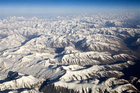 Aerial View Of The Snow Covered Himalaya Mountains As Seen On The